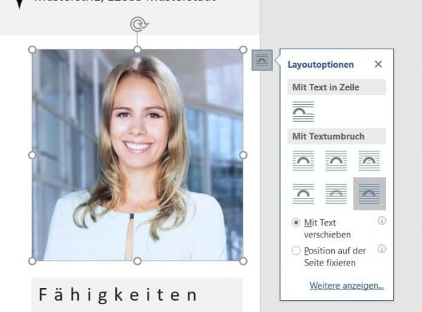 Move the photo in front of the text in Word. In the next step you can cut out the photo round.